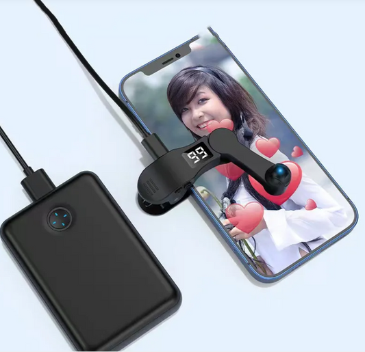 Illumiwave Auto Screen Clicker attached to a smartphone for automating tasks.