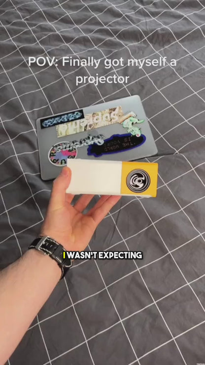 IllumiWave Mini HD Movie Projector – Turn Any Wall Into a Home Theater